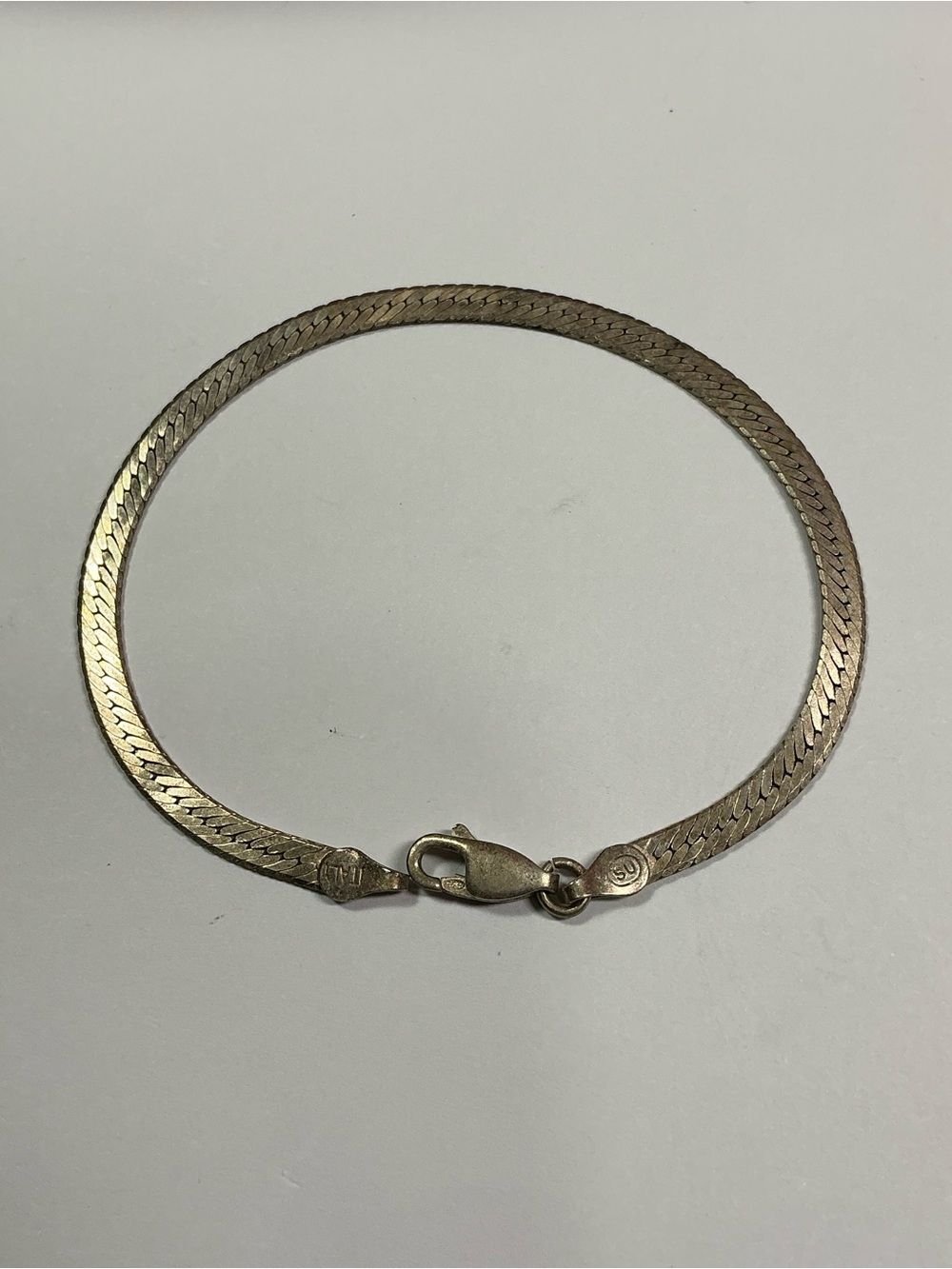 SU Sterling Silver Italian Flat Bracelet. 7 inches long